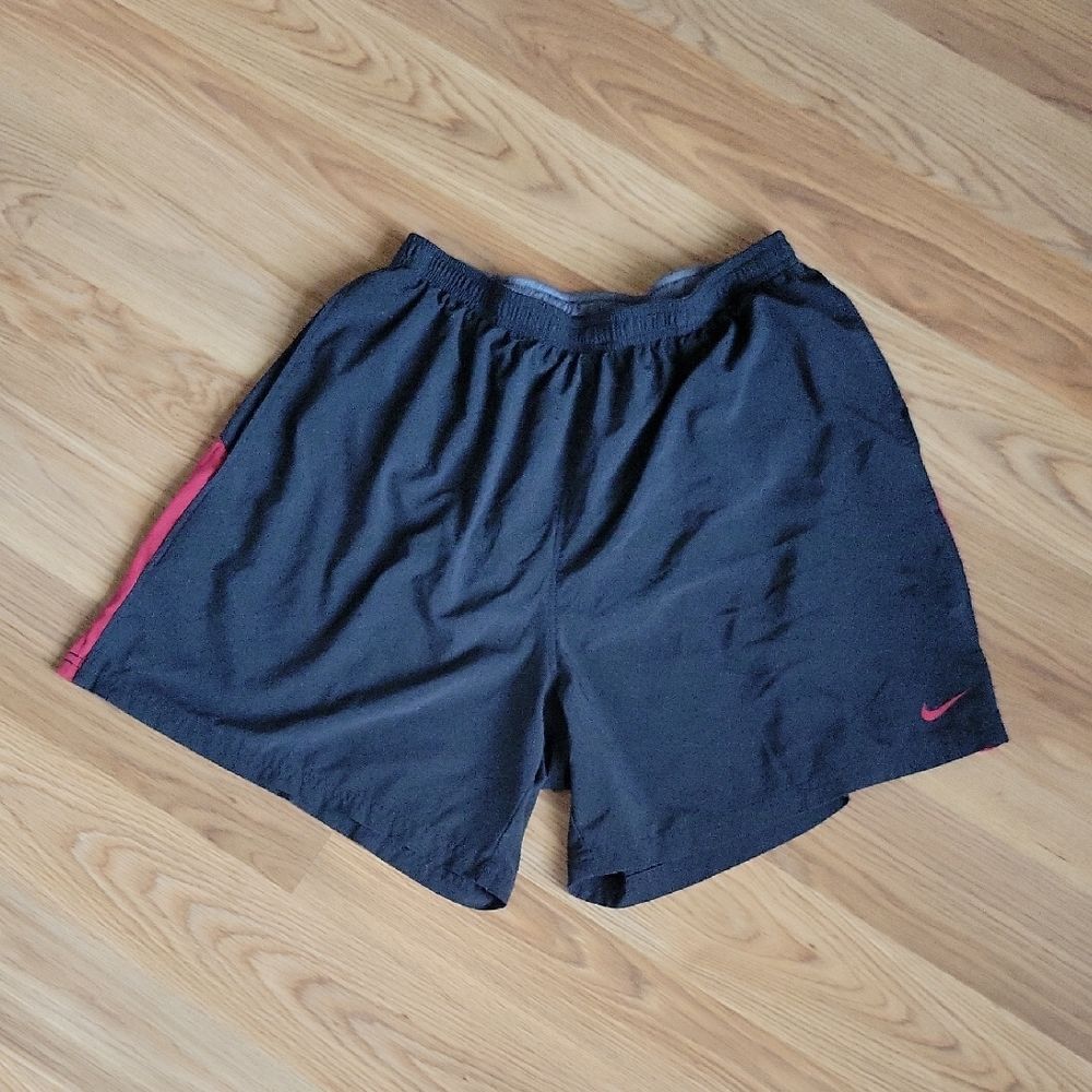 Nike Black Shorts with Pink Swoosh and Side Stripe